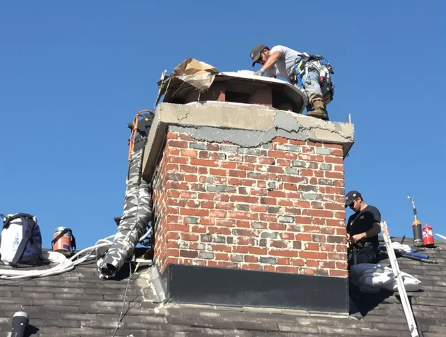 Whittier Chimney Sweep installing a custom chimney crown in Whittier, CA