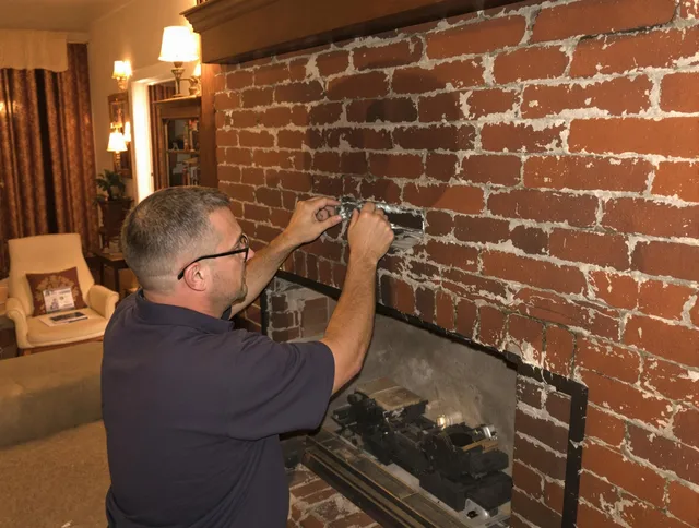 Whittier Chimney Sweep expert fixing a fireplace in Whittier, CA